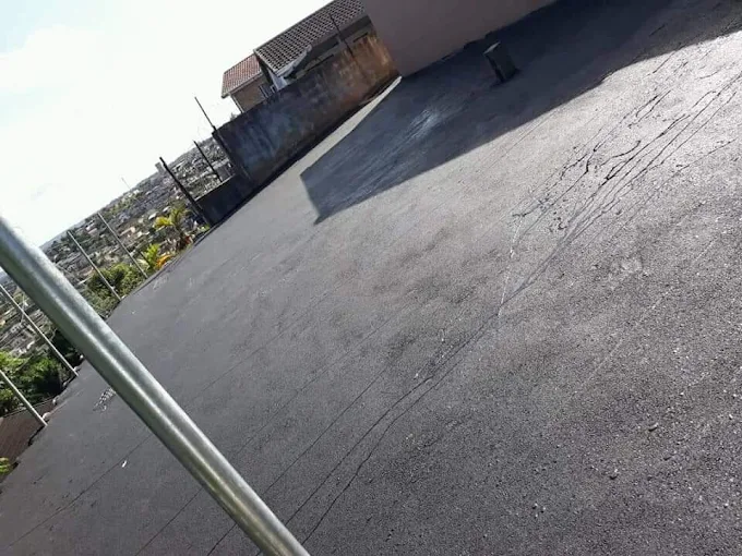 Private access road tar installation