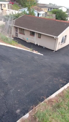 Commercial parking area tar surfacing in PMB